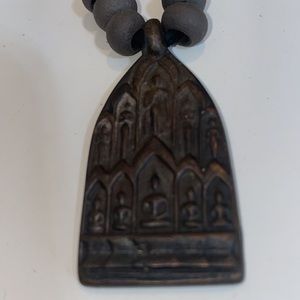 Buddha chapel necklace.